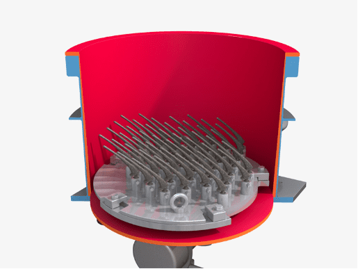 A red and silver machine with many metal rods in it.