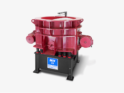 A red machine with two large metal parts.