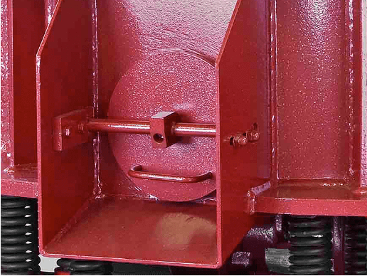 A close up of the side of a red machine